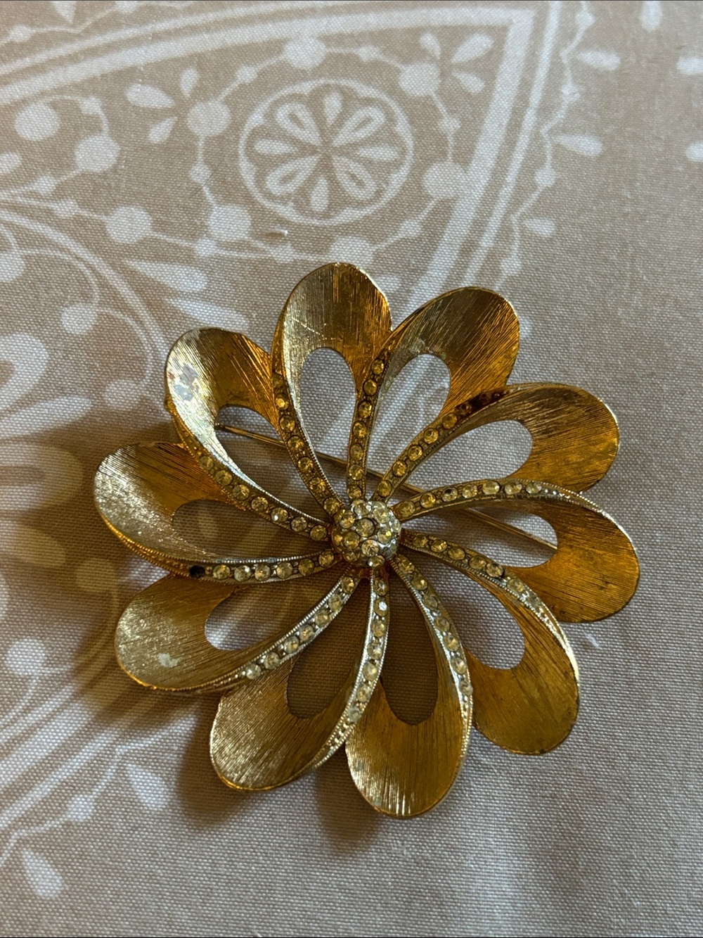 Monet Gold Floral Ribbon Brooch with Clear Rhinestones